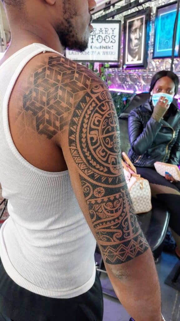 Airbrushed Tribal Half Tattoo Sleeve at Tat Bar Las Vegas